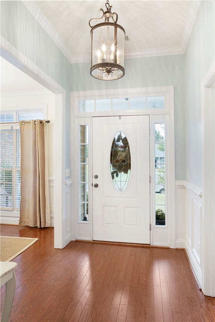 611 Shadow Wood Dr, Smiths Station, AL 36877, Gleaming hardwood floors and classic wainscoting d