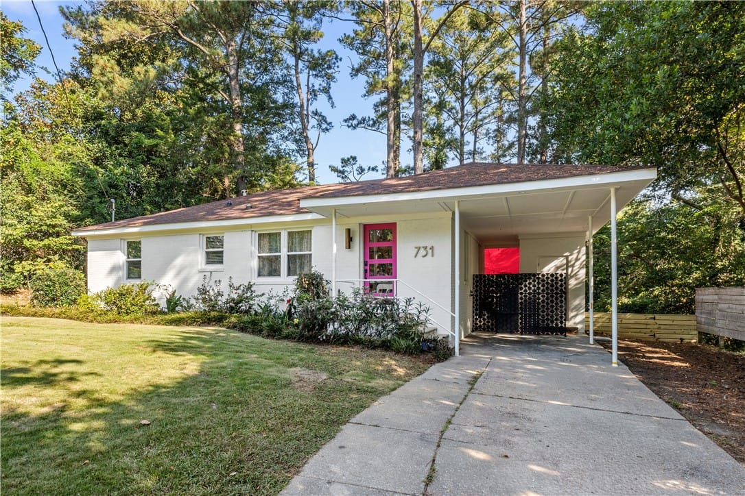 731 Mercer Cir, Auburn, AL 36830, A vibrant fuchsia door welcomes you to this classi