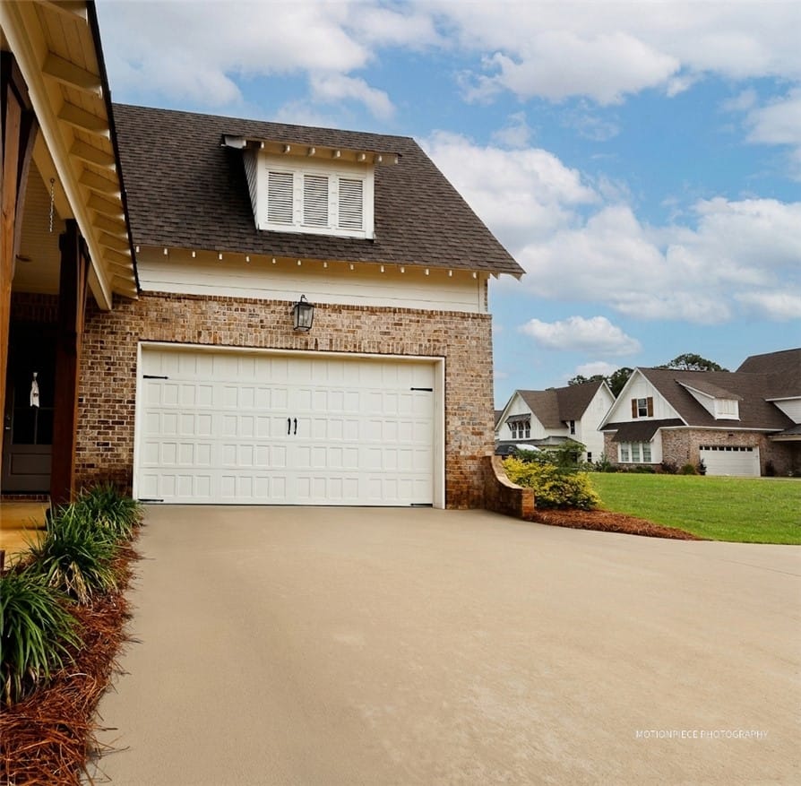 1203 Ruth Wy, Auburn, AL 36830, A well-maintained concrete driveway leads to a cha