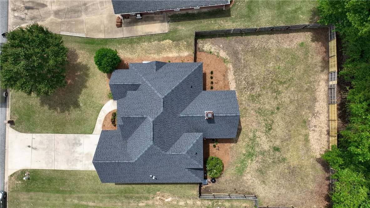 611 Shadow Wood Dr, Smiths Station, AL 36877, An aerial view showcases a residential property fe